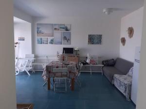 Зона вітальні в Casa Capo Falcone - Terraced house with wonderful sea view -