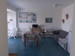 Posezení v ubytování Casa Capo Falcone - Terraced house with wonderful sea view -