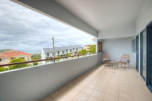 Ein Balkon oder eine Terrasse in der Unterkunft Coffs Jetty Beach House