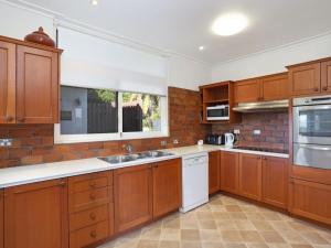 A kitchen or kitchenette at The Lookout - Coffs Harbour, NSW