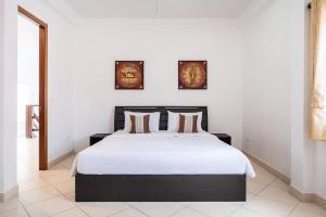 Ένα ή περισσότερα κρεβάτια σε δωμάτιο στο Wongamart Pool Villa +35 φωτογραφίες