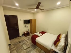 Postel nebo postele na pokoji v ubytování GT Grande Hotel-Near US Consulate