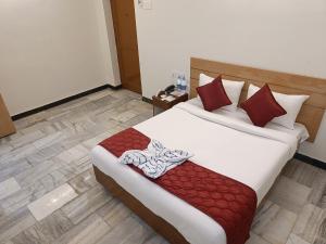 Postel nebo postele na pokoji v ubytování GT Grande Hotel-Near US Consulate