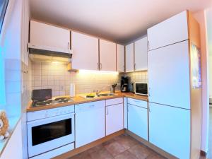 Kuchyň nebo kuchyňský kout v ubytování Haus Seebär Whg. 1 Hollwert 29a 70qm