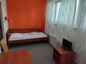Posteľ alebo postele v izbe v ubytovaní BEST Hotel Garni