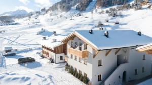 Chalet Marmotta NEVE - Luxus Chalet Ski-In Ski-Out v zimě
