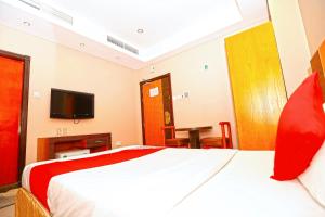 Postel nebo postele na pokoji v ubytování Sea Shell Hotel