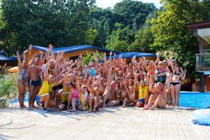 a group of people posing for a picture at a swimming pool at Kaliakra Beach Hotel - Ultra All Inclusive in Albena