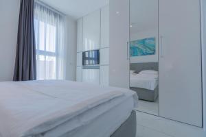 Postel nebo postele na pokoji v ubytování Villa Allegra Luxury Apartments + 37 fotografií