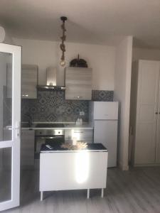 Kuchyň nebo kuchyňský kout v ubytování Casa Daflanna in Salento