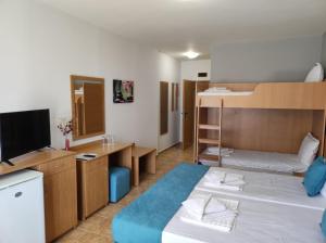 Postel nebo postele na pokoji v ubytování Аурелия Бей