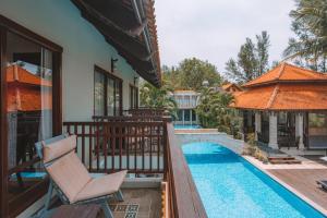 Bazén v ubytování Khaolak Oriental Resort - Adult Only nebo v jeho okolí
