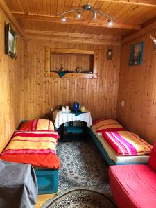 מיטה או מיטות בחדר ב-Złoty Kłos