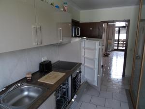 a kitchen with a sink and a counter top at Fewo Lena in Welling