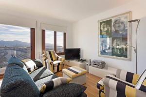 Μια τηλεόραση ή/και κέντρο ψυχαγωγίας στο Apartment Faroles 4 By SunVillas Mallorca
