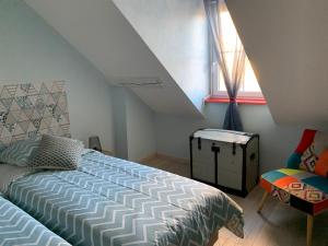 Posteľ alebo postele v izbe v ubytovaní LA VILLA CAPUCINE