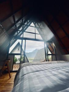 Postel nebo postele na pokoji v ubytování Bukit Tiga Lima Boutique Hotel