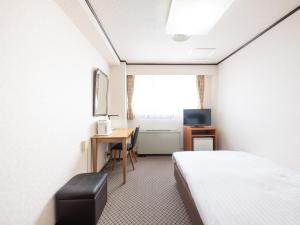 TV a/nebo společenská místnost v ubytování Tabist Hotel New Washington Shibuya