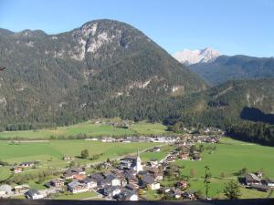 an aerial view of a village in the mountains at Zenauerhof in Sankt Martin bei Lofer