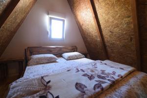 Postel nebo postele na pokoji v ubytování Cabarkapa Guesthouse