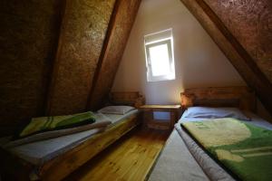 Postel nebo postele na pokoji v ubytování Cabarkapa Guesthouse