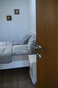 Postel nebo postele na pokoji v ubytování Cabarkapa Guesthouse