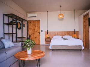 A bed or beds in a room at Petrichor
