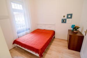 Ένα ή περισσότερα κρεβάτια σε δωμάτιο στο B32 Gellert Apartment