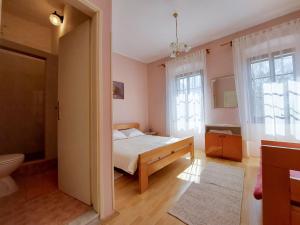 Ένα ή περισσότερα κρεβάτια σε δωμάτιο στο Rooms Nada