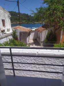 a view from a balcony of a building and a river at Eutyxia House in Gaios Walk to Center & Beaches in Gaios
