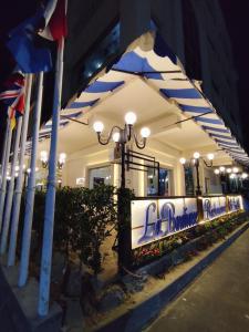 a building with a street light in front of it at La Boutique Residence in Hurghada