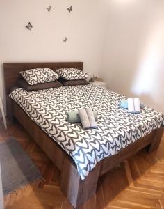 Postel nebo postele na pokoji v ubytování Apartment Jacky