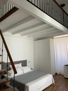 Postel nebo postele na pokoji v ubytování Casa Margherita