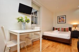Ein Bett oder Betten in einem Zimmer der Unterkunft Concept Serviced Apartments by Concept Apartments