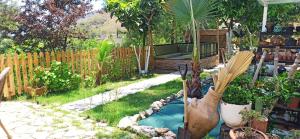 Um jardim em Swiss Eviniz Hotel