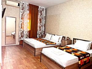 Ένα ή περισσότερα κρεβάτια σε δωμάτιο στο SAFAR hotel