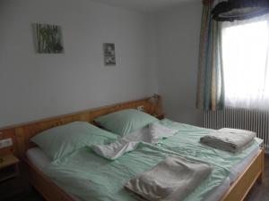 Postel nebo postele na pokoji v ubytování Ferienwohnung Oberrauter