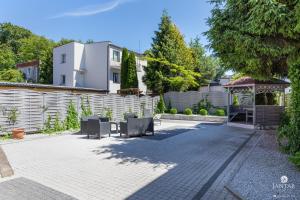 Vonkajšia záhrada v ubytovaní Jantar Apartamenty Sobieskiego
