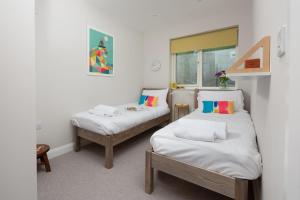 Ένα ή περισσότερα κρεβάτια σε δωμάτιο στο Tralee