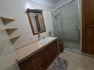Ванная комната в CAROLINA SUITE APARTMENT