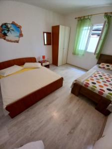 Posteľ alebo postele v izbe v ubytovaní Apartments Berti