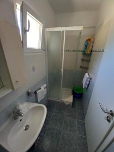 Kúpeľňa v ubytovaní Apartments Berti