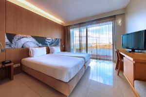 TV a/nebo společenská místnost v ubytování Agua Hotels Riverside
