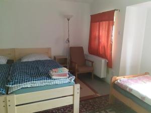 Posteľ alebo postele v izbe v ubytovaní Penzion Na Zámostí Malenice