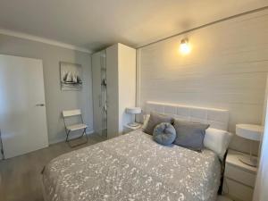 Posteľ alebo postele v izbe v ubytovaní Apartamentos Stil Mar Anna - L'Escala Stil Mar