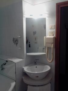 Koupelna v ubytování Hotel Niki