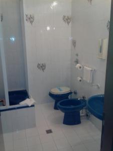 Koupelna v ubytování Hotel Niki