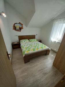 Posteľ alebo postele v izbe v ubytovaní Apartments Berti