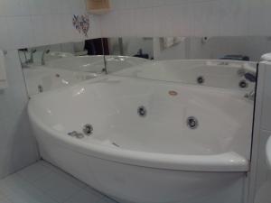 Koupelna v ubytování Hotel Niki