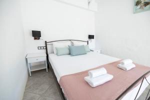 Posteľ alebo postele v izbe v ubytovaní Villa Del Greco